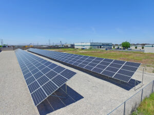 Ground mounted solar panels installed for a business in Utah, saving them money.